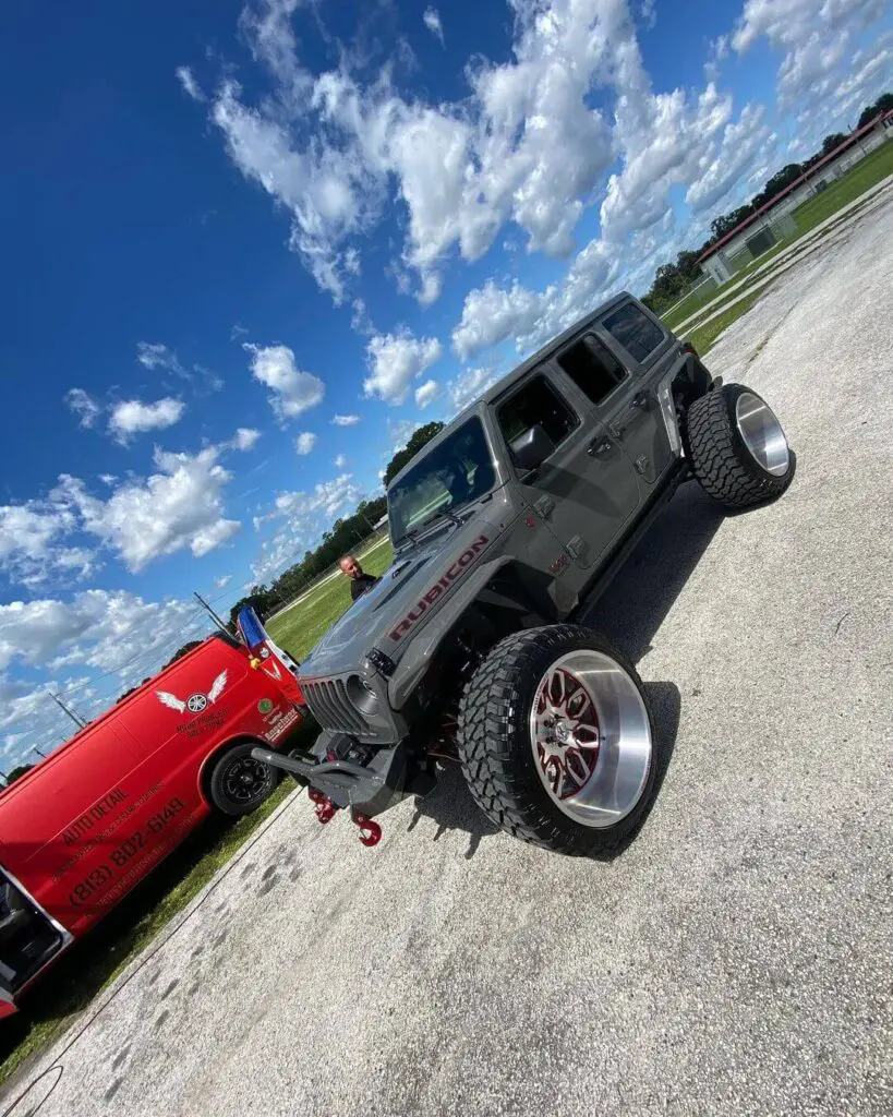 Lifted Jeep With Deep Dish Wheels Being Detailed